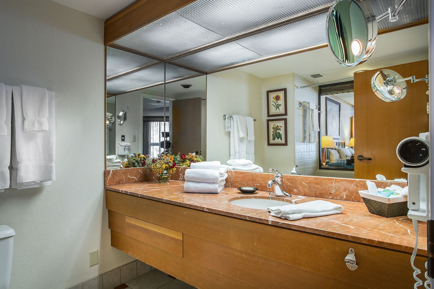 combined shower/bathtub, designer toiletries, hair dryer, towels