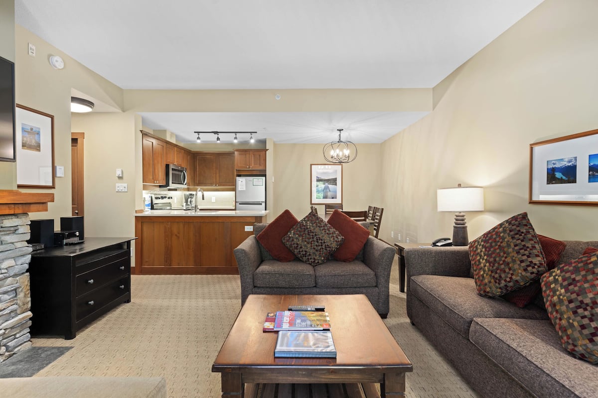 Two Bedroom #103 | Living area | 55-inch flat-screen TV with cable channels, Smart TV, fireplace