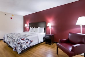 Premium bedding, pillow-top beds, desk, laptop workspace