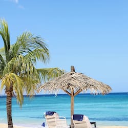 On the beach, sun loungers, beach umbrellas, beach towels