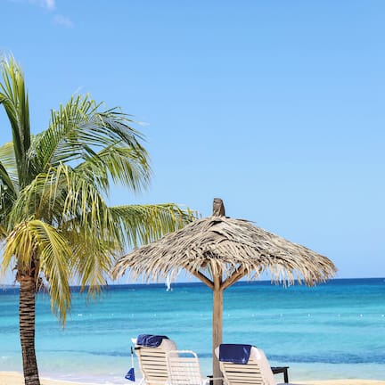 On the beach, sun loungers, beach umbrellas, beach towels