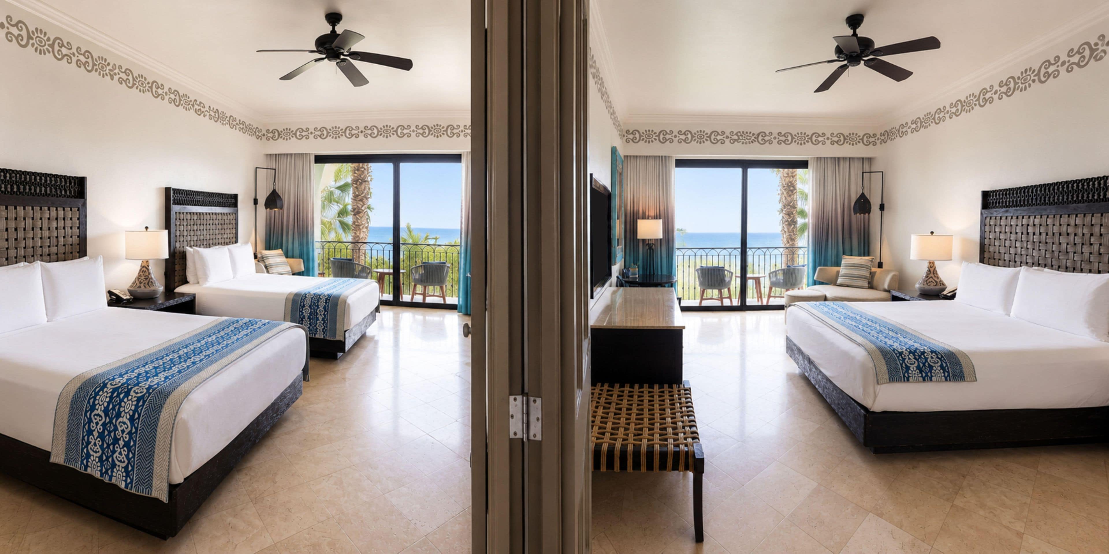 A hotel room with two beds, a balcony with a view, ceiling fans, and a minibar.