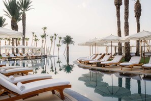 4 outdoor pools, cabanas (surcharge), pool umbrellas