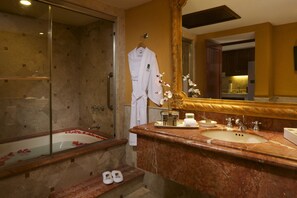 Shower, deep soaking tub, rainfall showerhead, eco-friendly toiletries