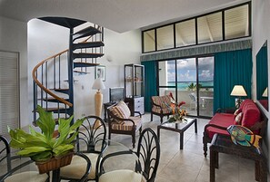 Suite, 2 Bedrooms | Living room | 27-inch TV with cable channels