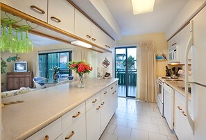 Two Bedroom Suite (with 2 baths) | Private kitchen | Full-sized fridge, microwave, oven, stovetop