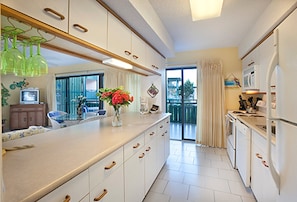 Two Bedroom Suite (with 2 baths) | Private kitchen | Full-size fridge, microwave, oven, stovetop