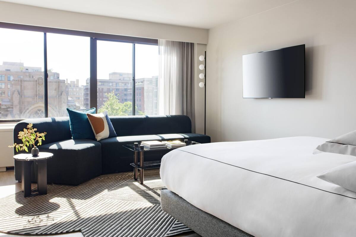 Frette Italian sheets, premium bedding, down comforters, in-room safe