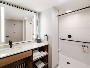 Suite, 1 King Bed, Roll-in Shower (Mobility Accessible) | Premium bedding, down comforters, in-room safe, desk - Atwell Suites Austin Airport by IHG (Austin)