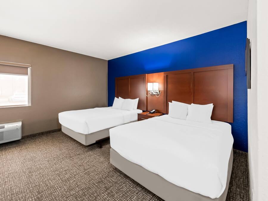 Desk, blackout drapes, iron/ironing board, rollaway beds