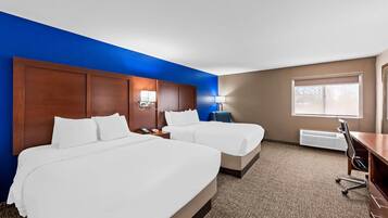 Desk, blackout drapes, iron/ironing board, rollaway beds