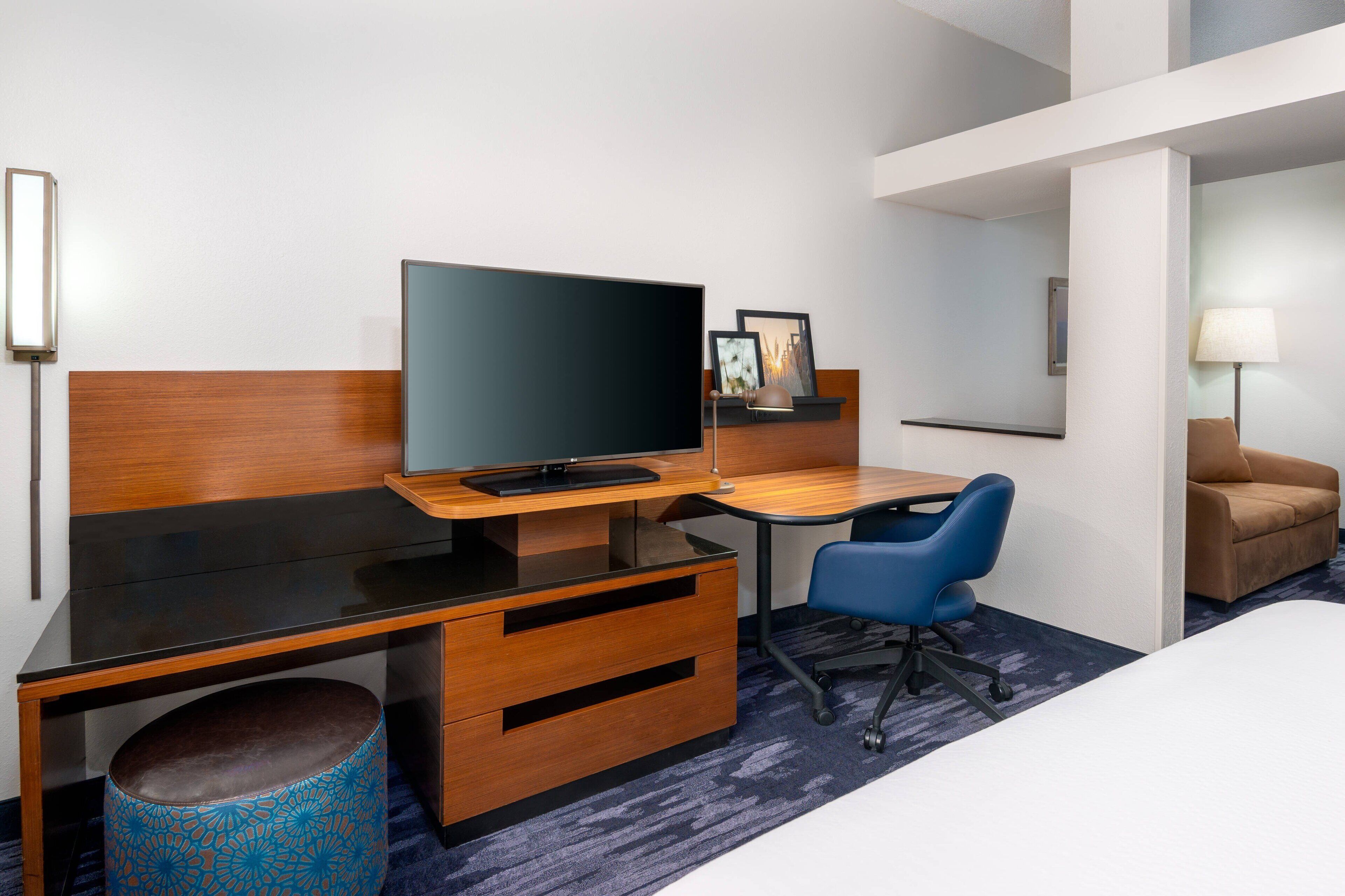 desk, blackout curtains, iron/ironing board, free cots/infant beds