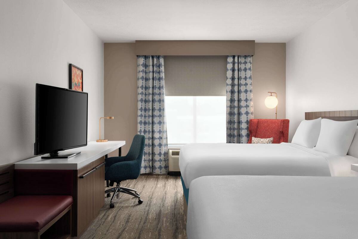 Hypo-allergenic bedding available, down comforters, in-room safe, desk