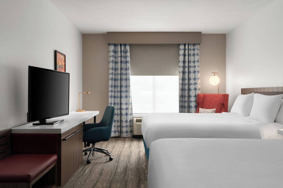 Hypo-allergenic bedding available, down comforters, in-room safe, desk