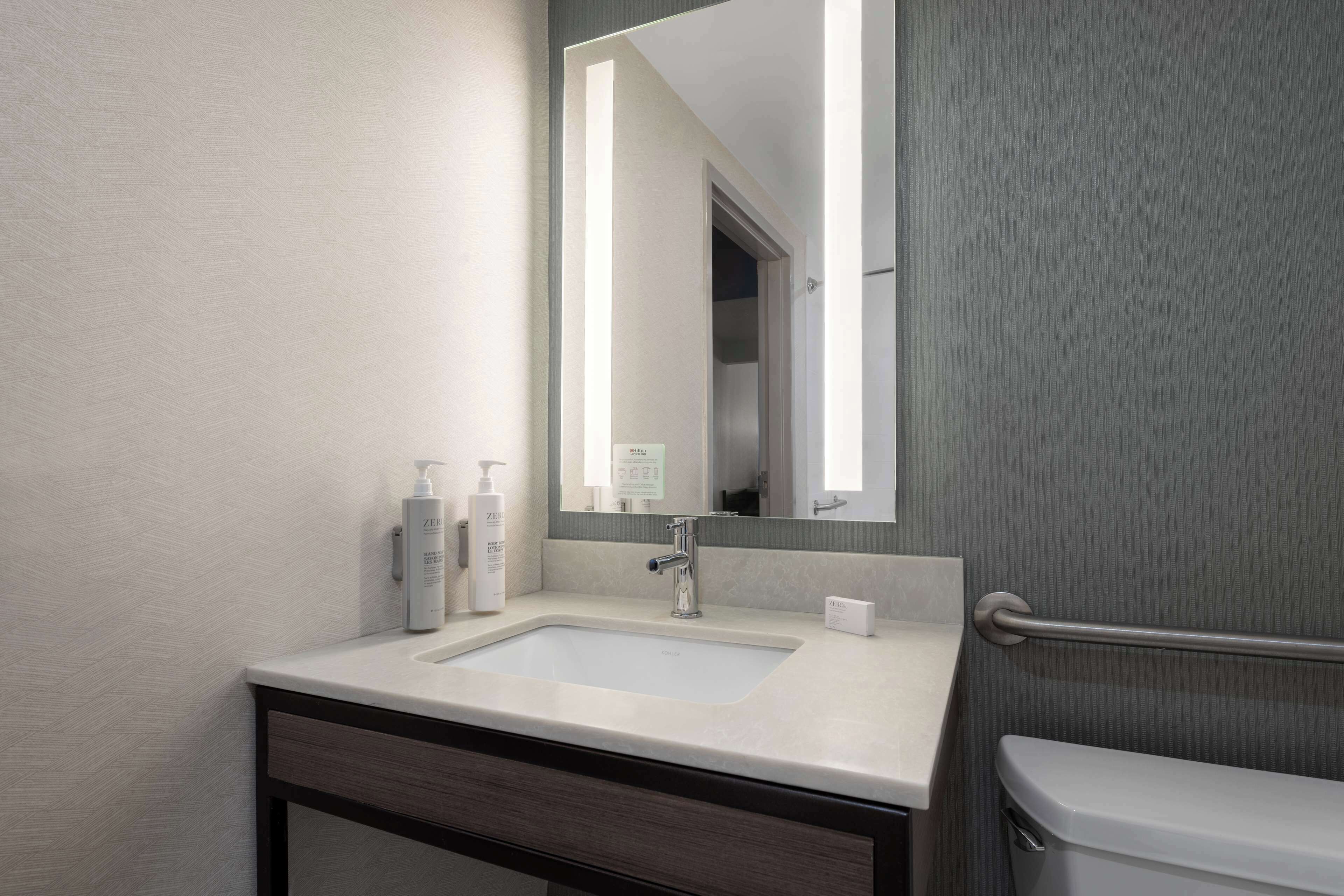 hair dryer, towels, soap, shampoo