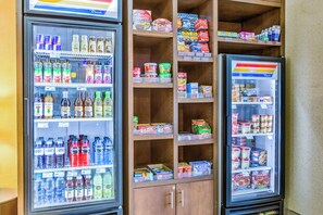 A refrigerated display case with various beverages and snacks. - Holiday Inn Express & Suites Dublin by IHG (Dublin)