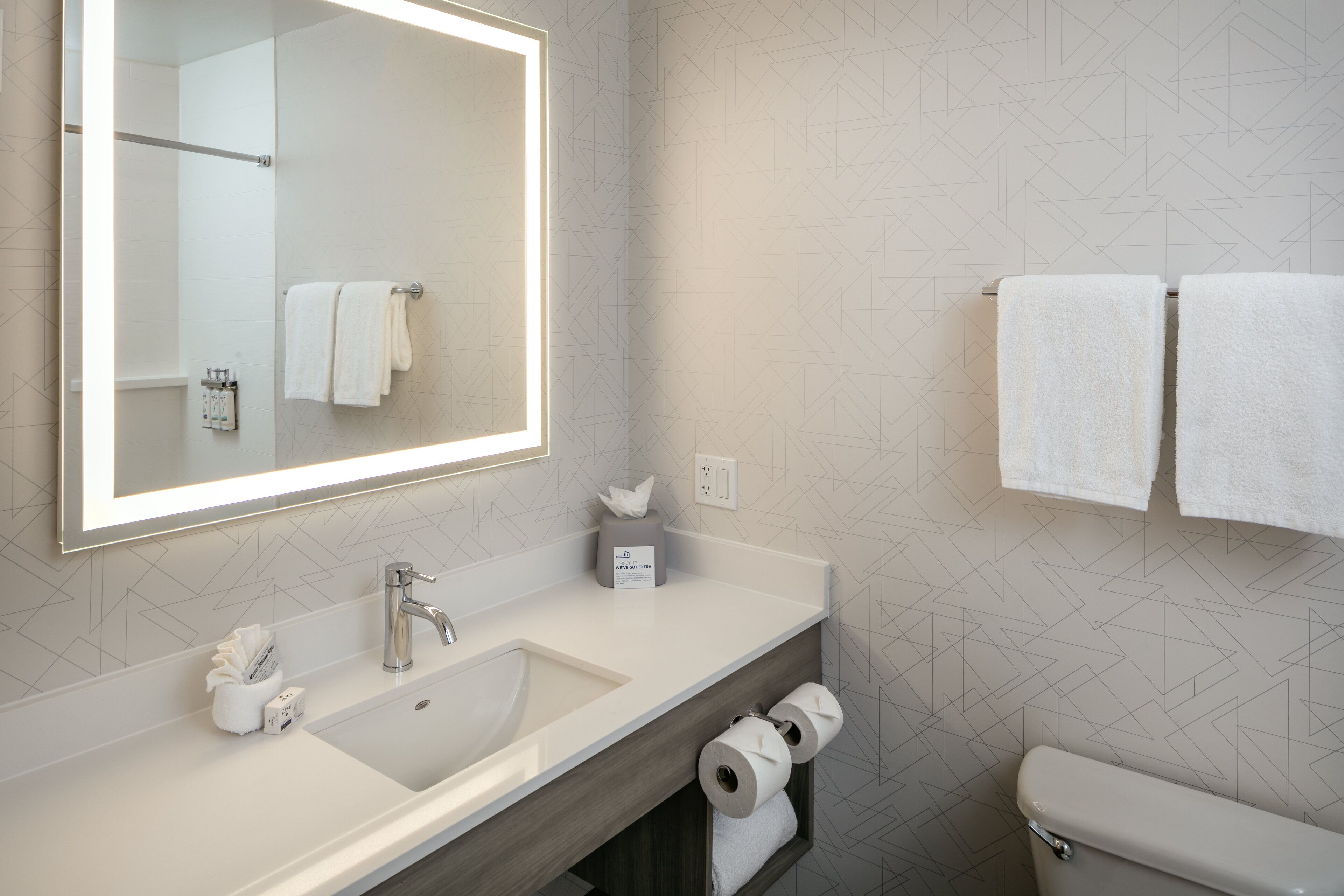 combined shower/bathtub, free toiletries, hair dryer, towels