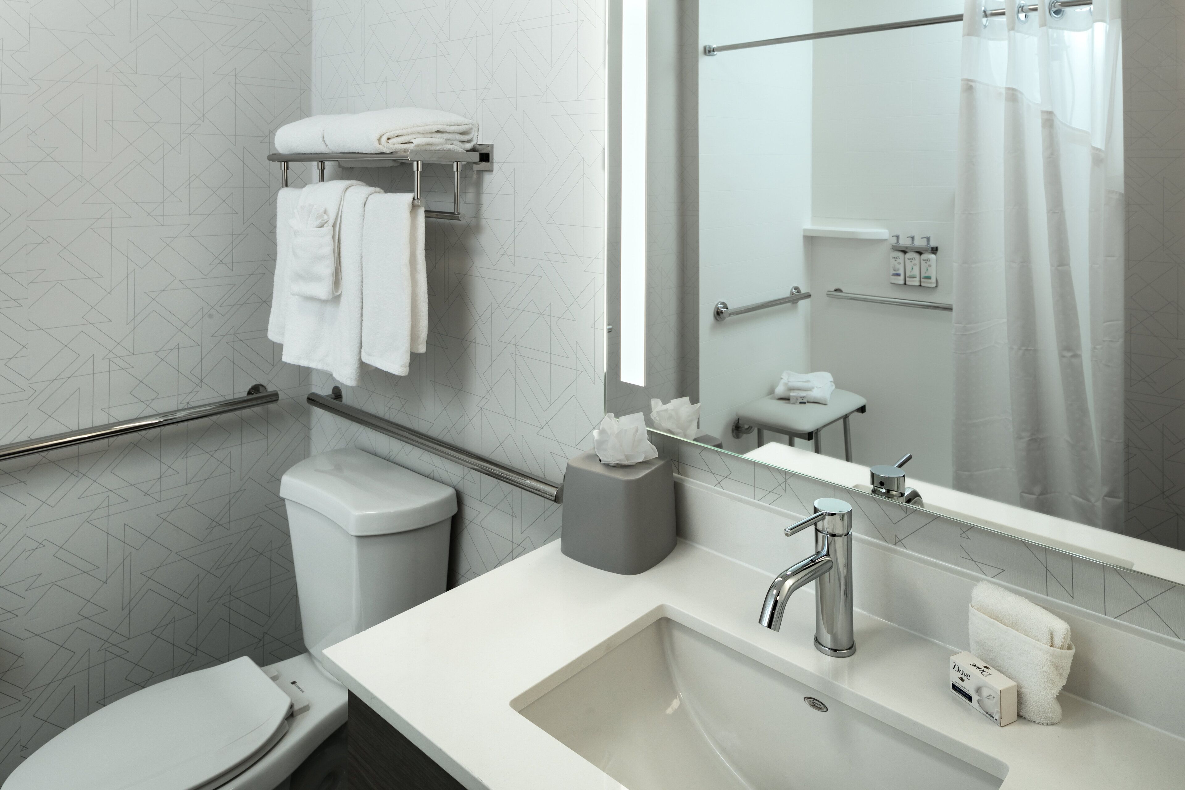 combined shower/bathtub, free toiletries, hair dryer, towels