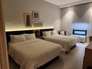 Deluxe Double Room, 2 Queen Beds, Non Smoking | Blackout drapes, free WiFi, bed sheets, alarm clocks