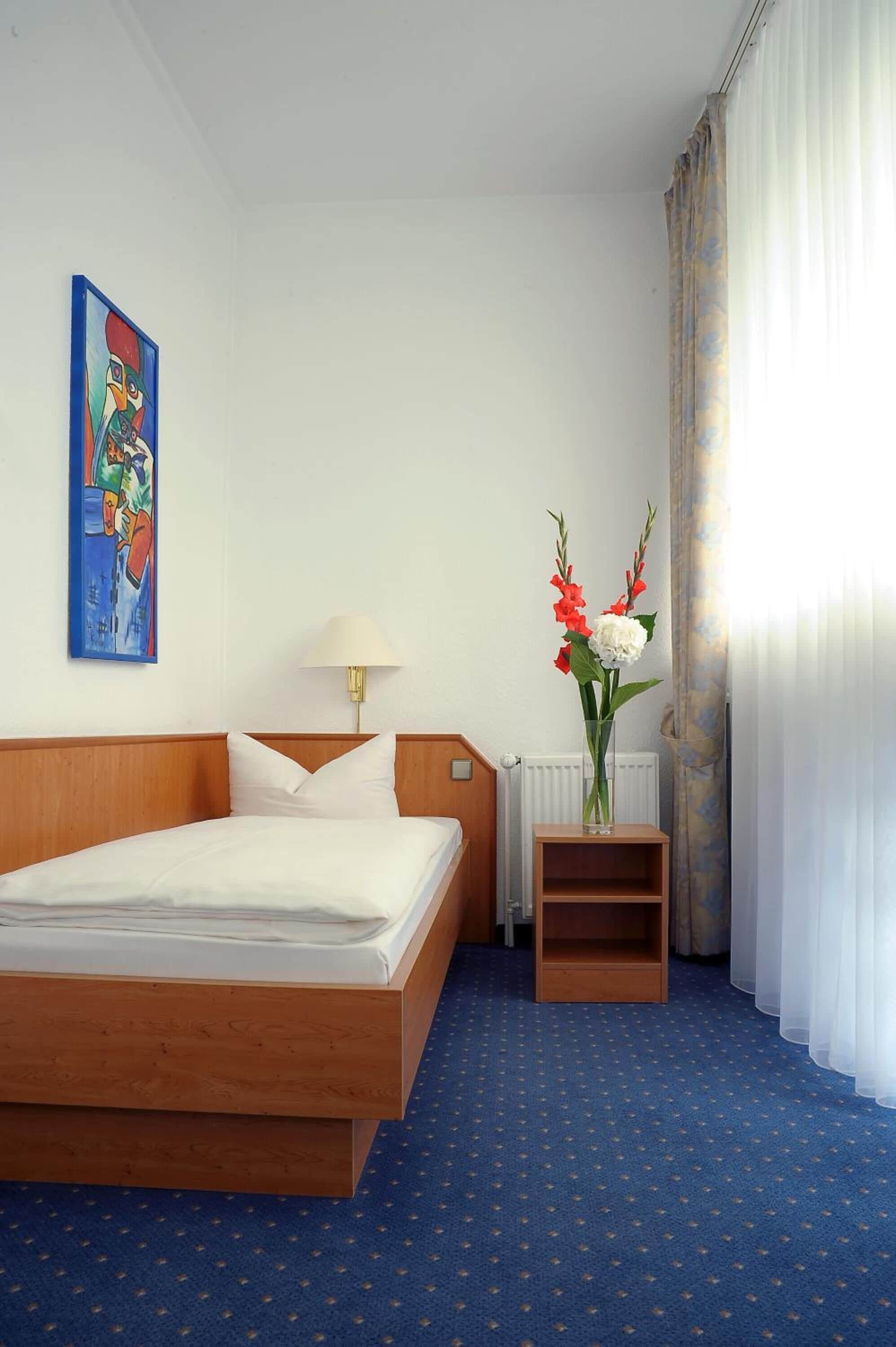 hypo-allergenic bedding, desk, blackout curtains, soundproofing