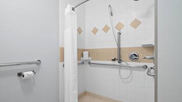 Room, 1 King Bed | Bathroom | Combined shower/tub, free toiletries, hair dryer, towels