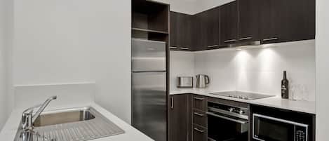 Standard Two Bedroom Apartment | Private kitchen | Fridge, microwave, stovetop, dishwasher