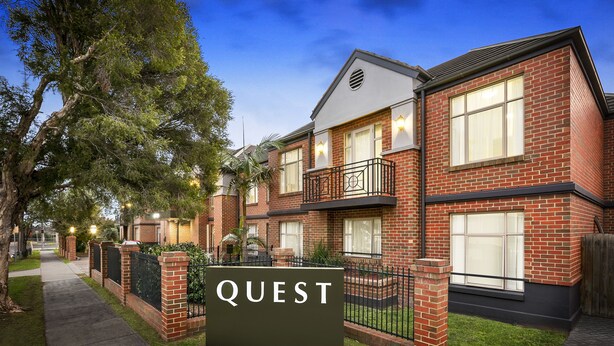 A two-story brick building with a sign reading "QUEST" in front. - Quest Dandenong (Dandenong)