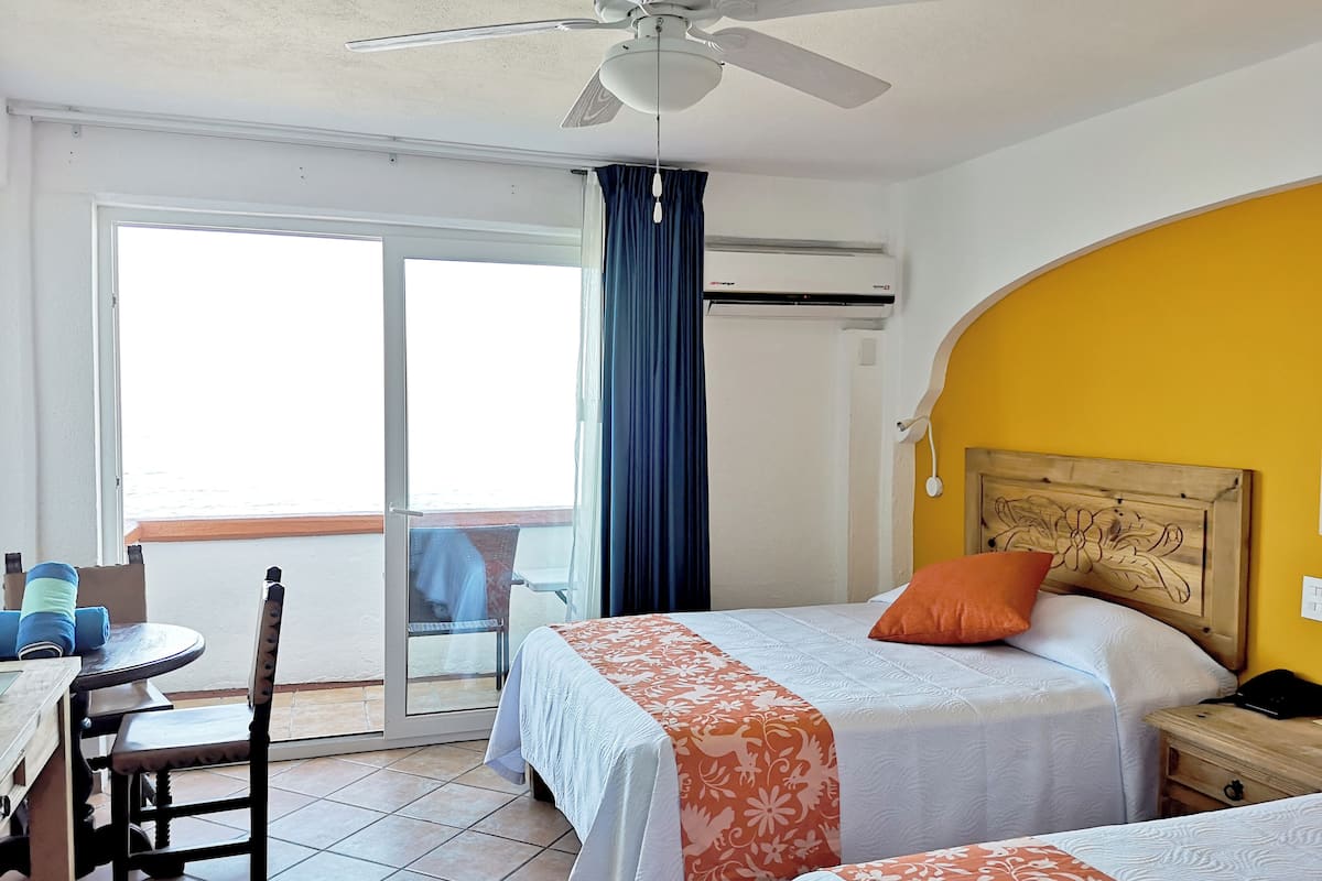 Standard Room, 2 Double Beds, Ocean View | Premium bedding, in-room safe, individually decorated