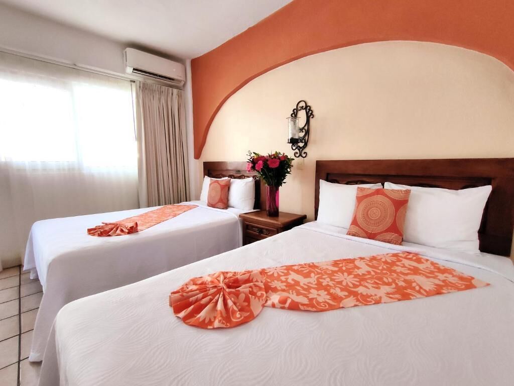 Roupas de cama premium, cofres nos quartos, individualmente decorados