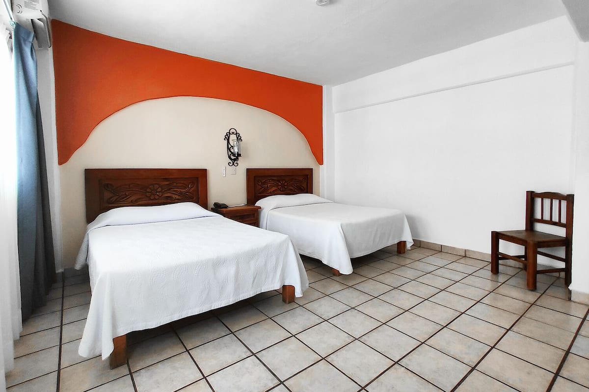 Standard Room, 2 Double Beds, Ensuite, City View | Premium bedding, in-room safe, individually decorated