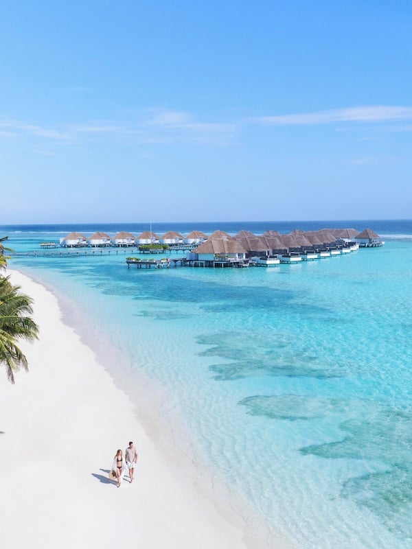On the beach, white sand, free beach cabanas, sun loungers