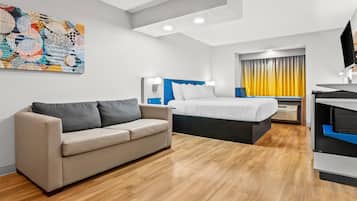 Svit - 1 kingsize-säng - icke-rökare | Värdeförvaringsskåp på rummet, skrivbord och mörkläggningsgardiner