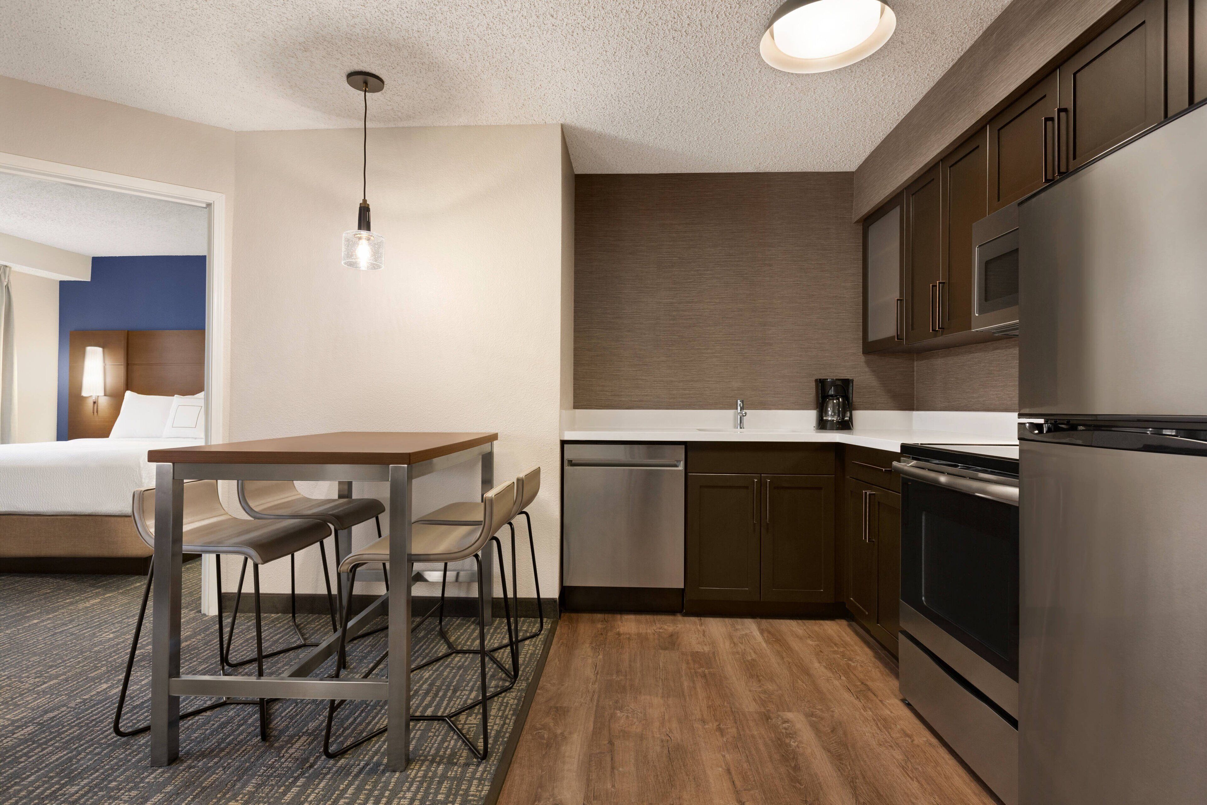 suite, 2 bedrooms | private kitchen | full-sized fridge, microwave, stovetop, dishwasher