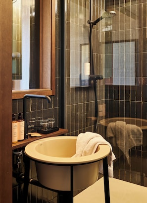 Shower, hydromassage showerhead, eco-friendly toiletries, hair dryer