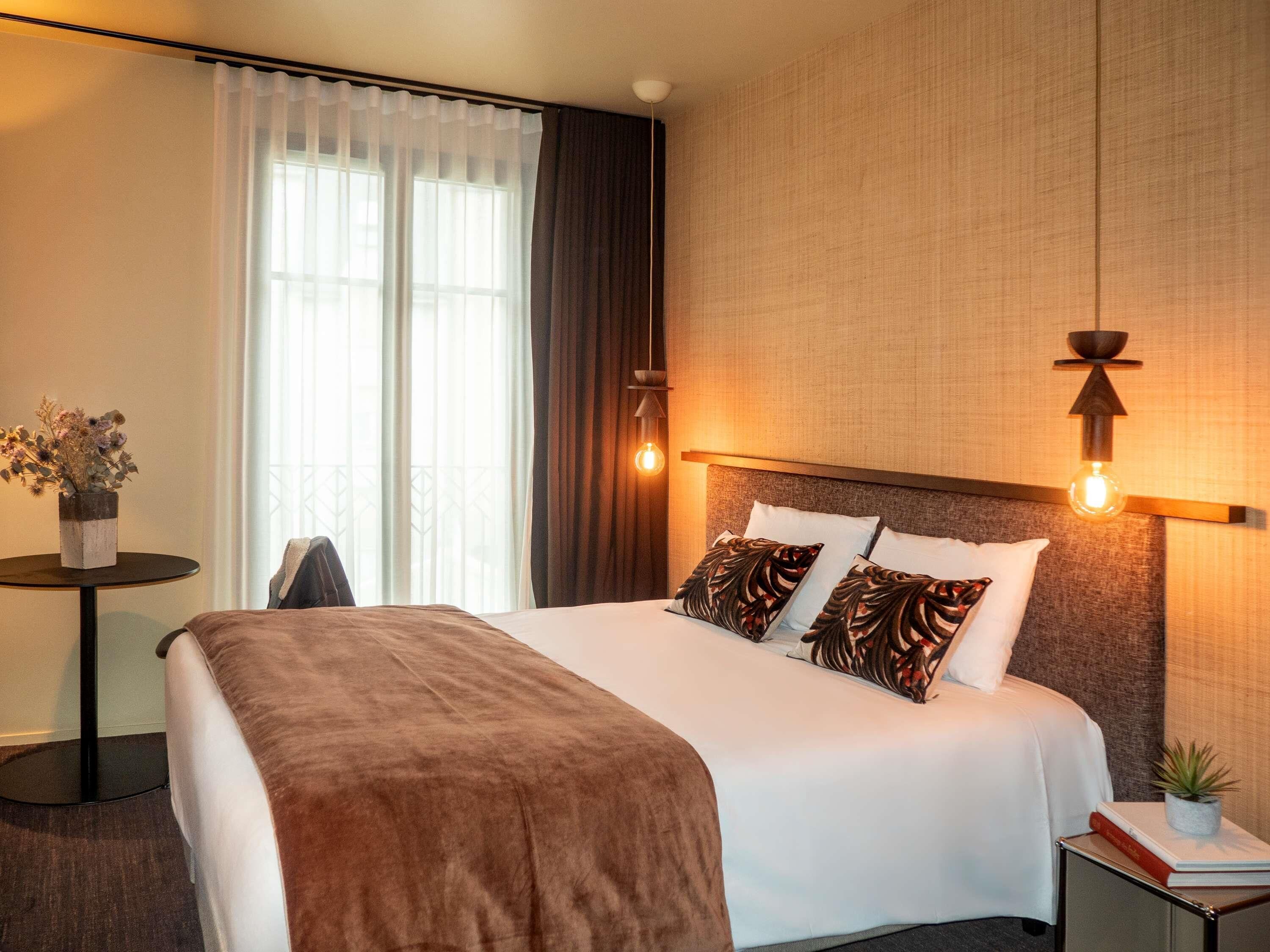 Chambre Classique, 1 lit double, vue partielle sur la mer