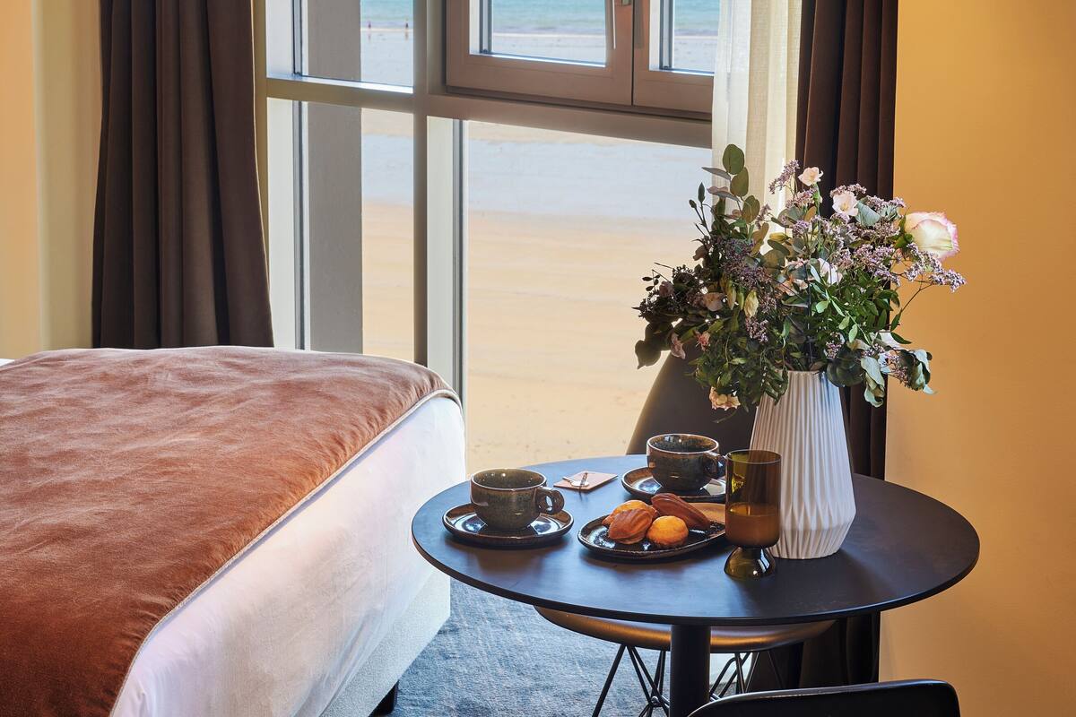 suite, 1 king bed with sofa bed, sea view | pillow-top beds, in-room safe, desk, blackout curtains