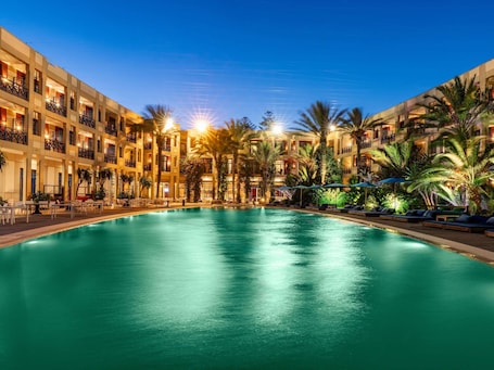 Indoor pool, outdoor pool, pool umbrellas