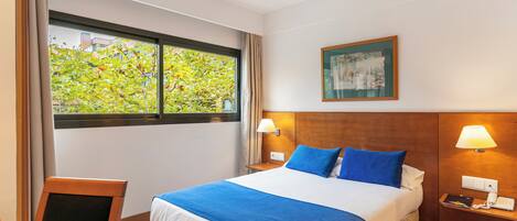 Premium-sengetøj, minibar, pengeskab på værelset, skrivebord