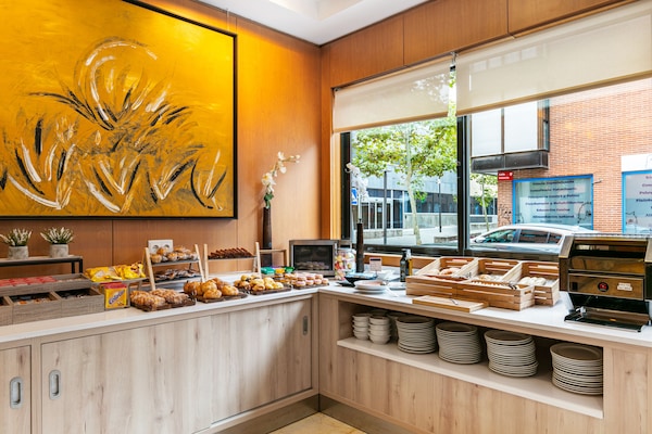 Daily buffet breakfast (EUR 13 per person)