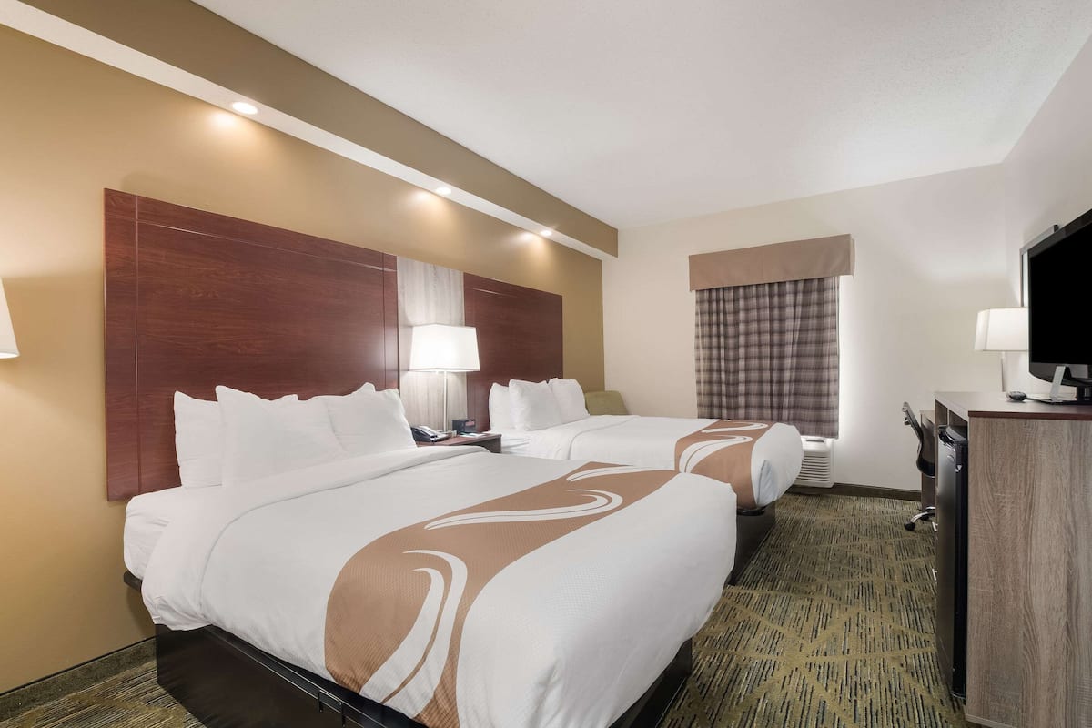 pillow-top beds, desk, laptop workspace, iron/ironing board