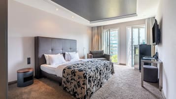 Hochwertige Bettwaren, kostenlose Minibar, Zimmersafe, Schreibtisch