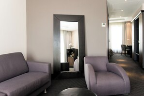 Junior Suite | Living area | 46-inch LCD TV with digital channels, TV