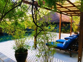 Outdoor pool, pool umbrellas, sun loungers