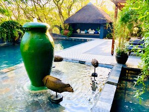 Outdoor pool, pool umbrellas, pool loungers