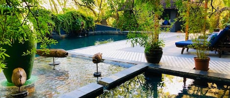 Outdoor pool, pool umbrellas, sun loungers