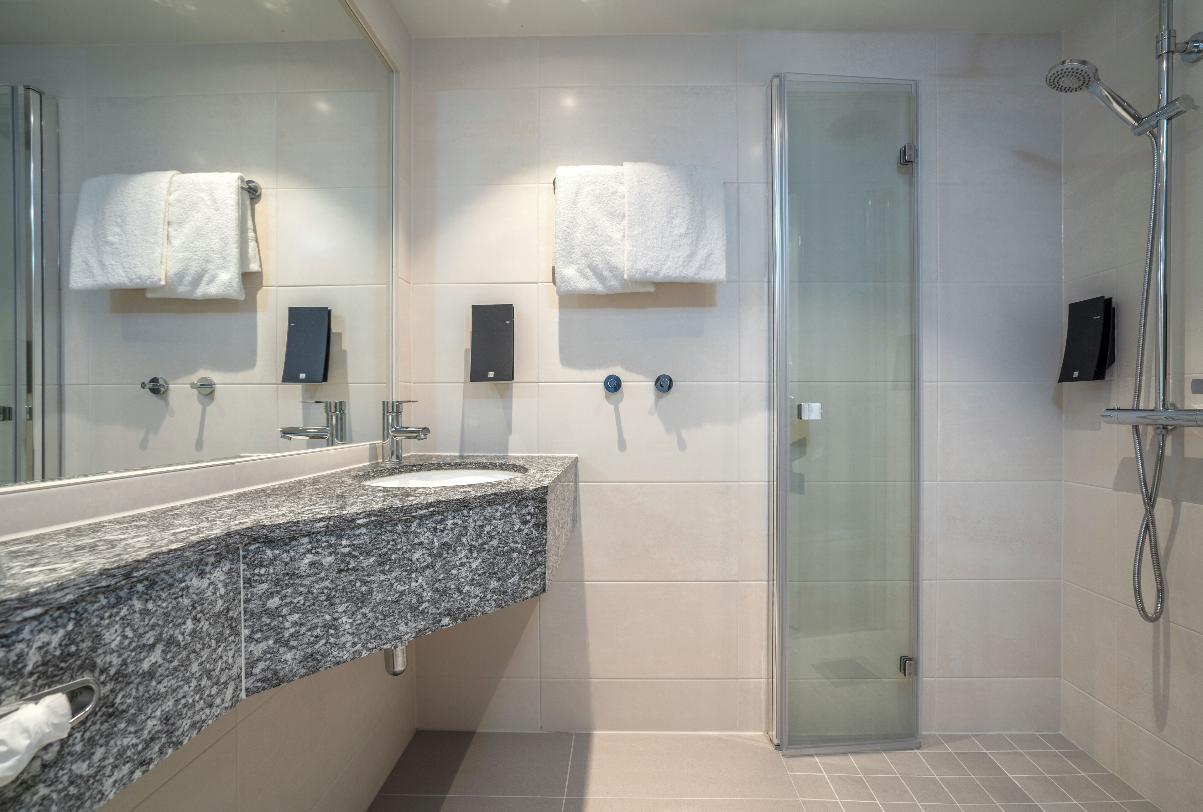 rainfall showerhead, hair dryer, heated floors, towels