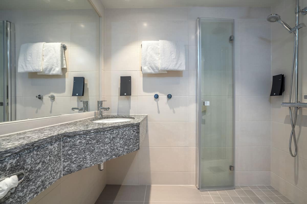 rainfall showerhead, hair dryer, heated floors, towels