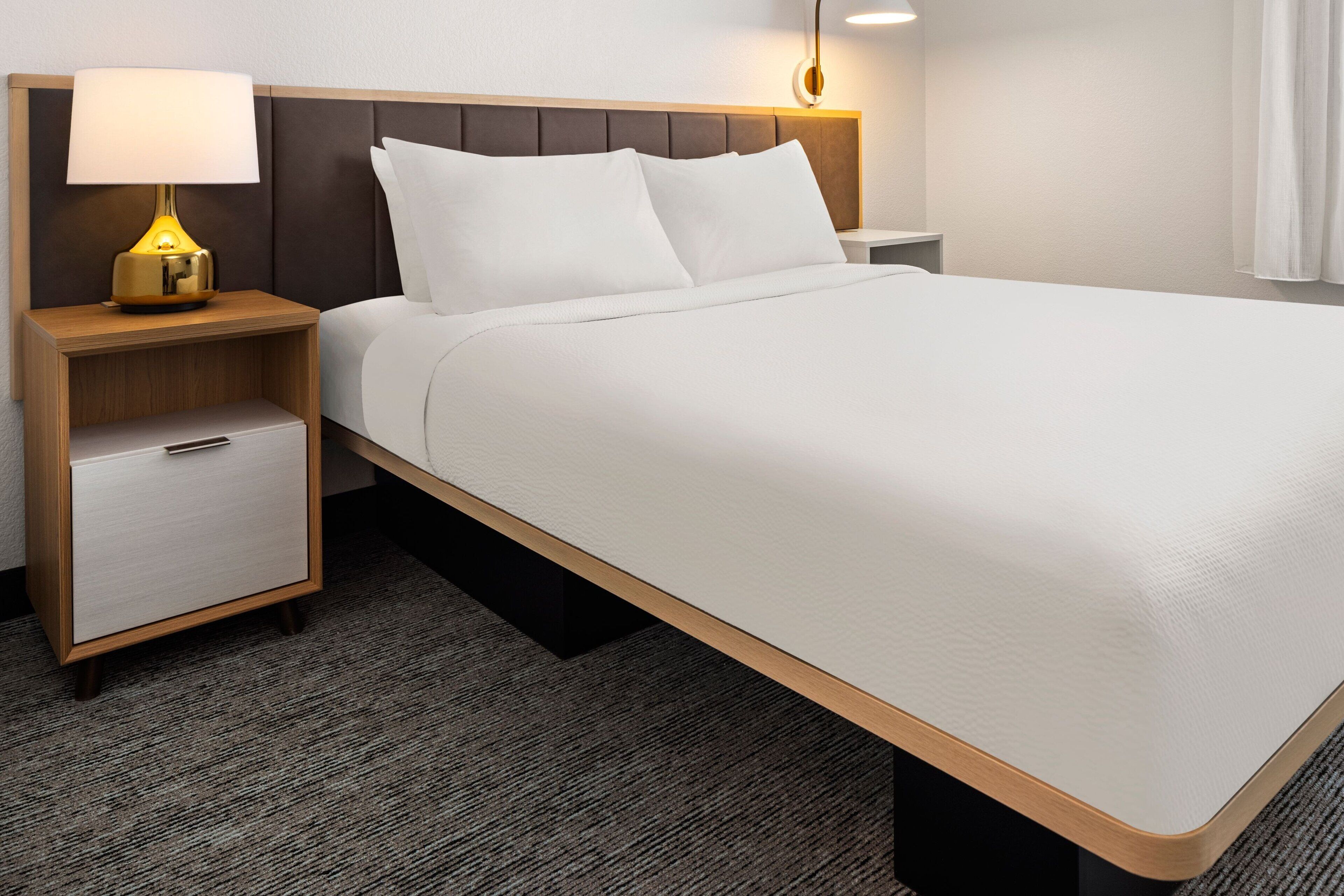 hypo-allergenic bedding, pillow-top beds, in-room safe, desk