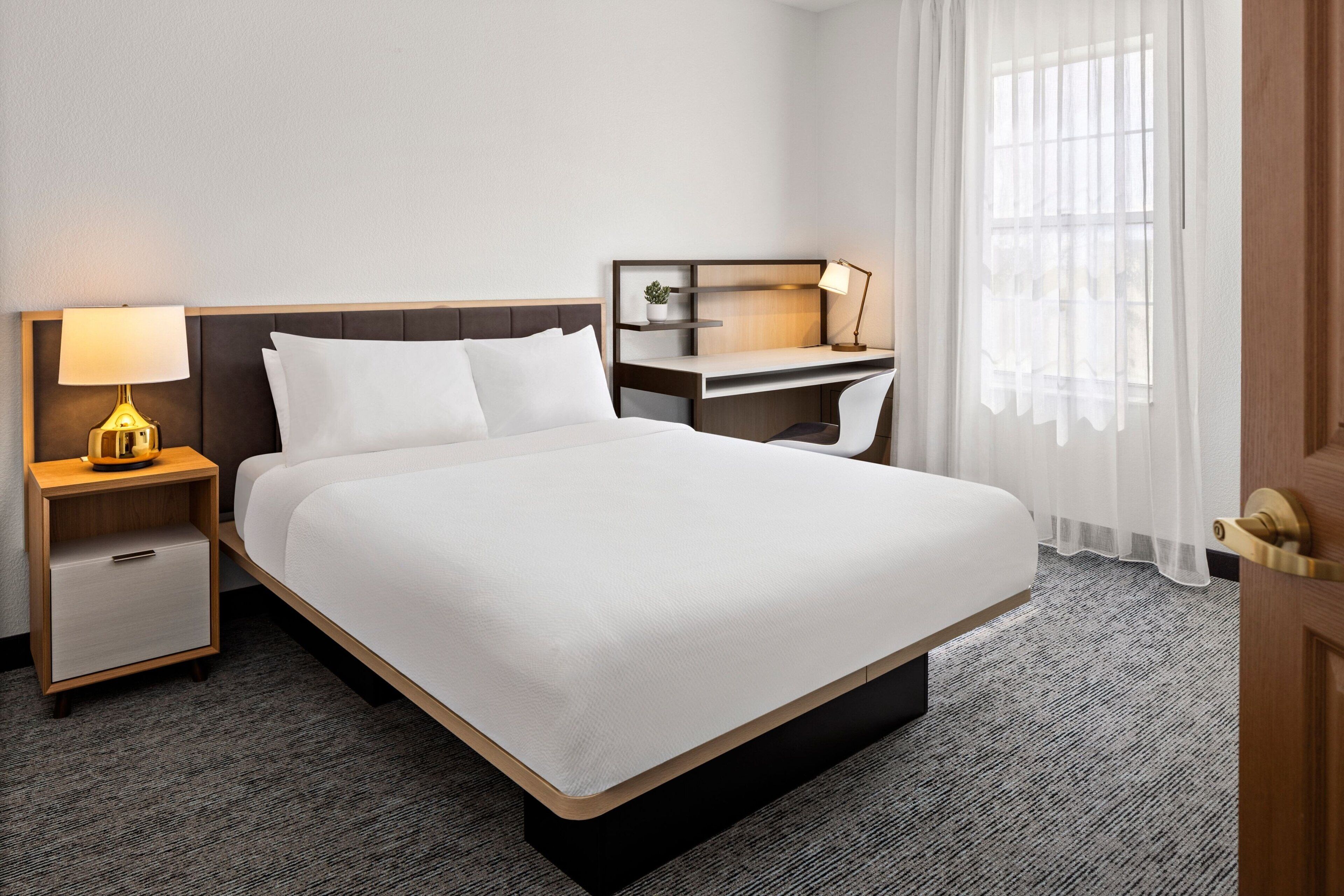 hypo-allergenic bedding, pillow-top beds, in-room safe, desk