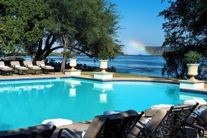 Outdoor pool, pool umbrellas, pool loungers